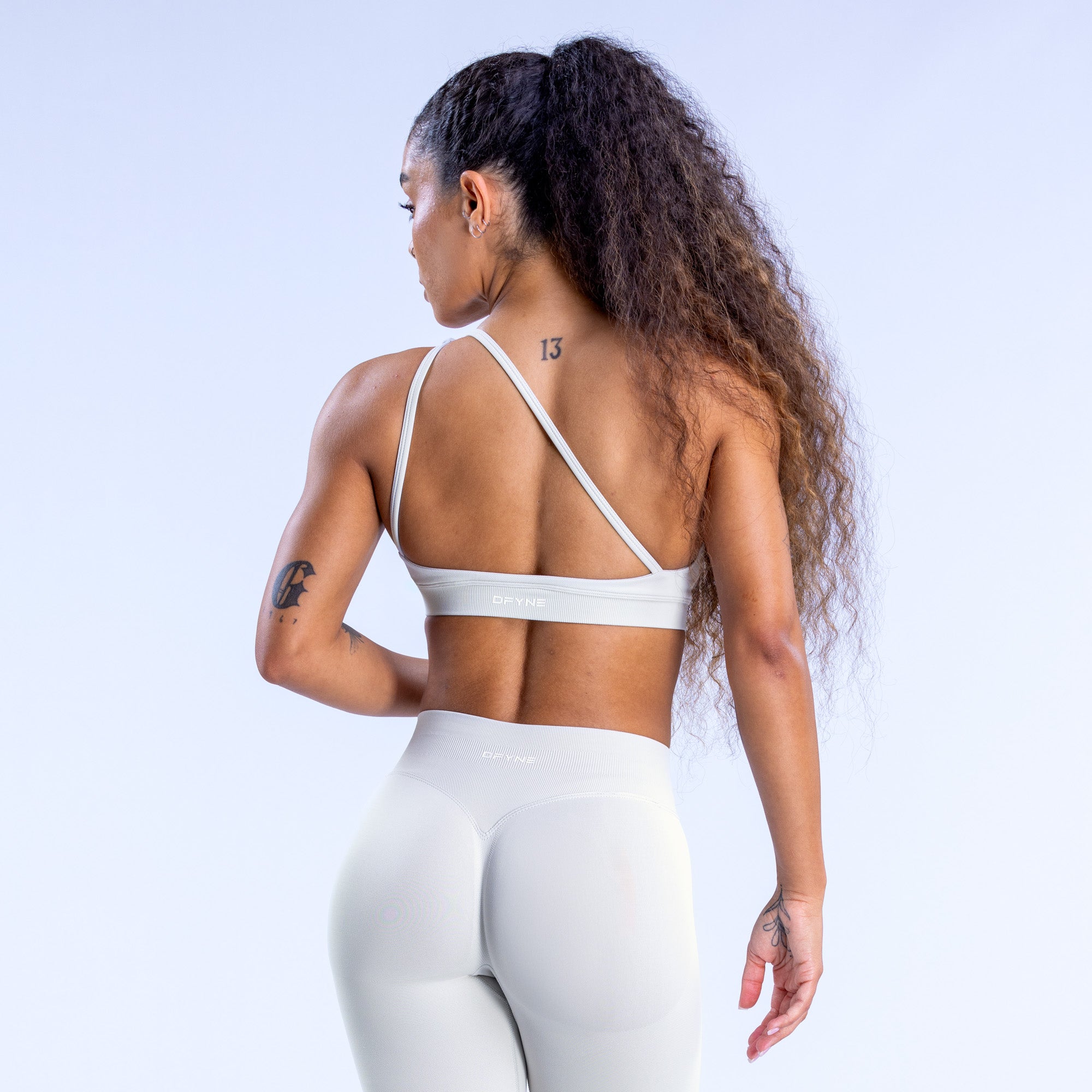 DFYNE Impact Asymmetric Sport Melltartó Női Fehér | 51743-JWFA